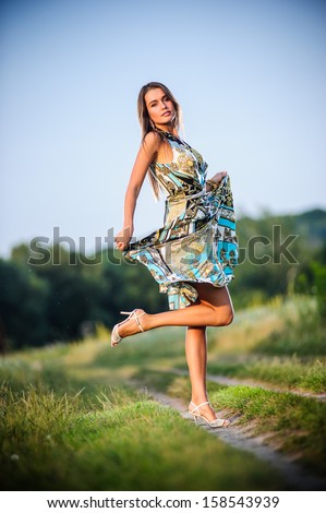 Outdoor portrait of yang and beautiful Slav woman.