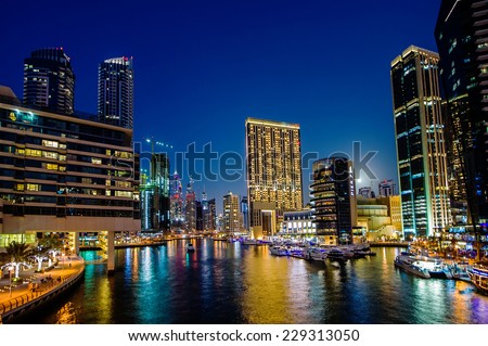 DUBAI, UAE - OCTOBER 16, 2014 : View of modern skyscrapers in Jumeirah beach residence on October 16, 2014 in Dubai, JBR - artificial canal city, carved along a 3 km stretch of Persian Gulf shoreline.