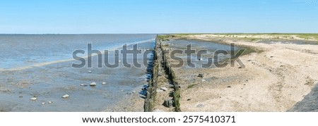 Similar – Image, Stock Photo The Wadden Sea World Heritage Site in Bensersiel near Esens in East Frisia on the coast of the North Sea, photographed in classic black and white