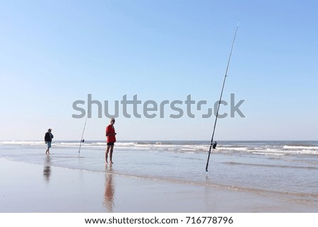 Similar – Image, Stock Photo Man stands with Frisian mink on the coast in the dunes