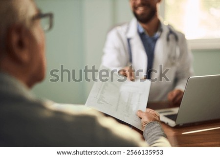 Image, Stock Photo Unrecognizable male doctor giving anesthesia to patient lying on couch before surgery