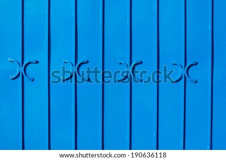 Blue metal fence pattern background