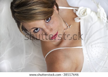 beautiful young bride in a wedding dress with a veil