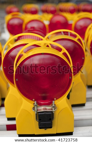 lots of orange traffic warning lights