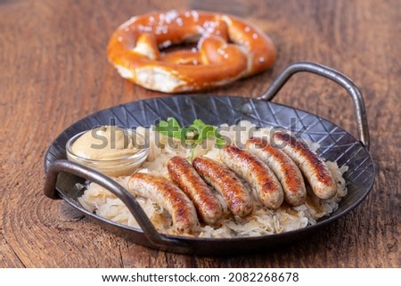 Similar – Image, Stock Photo Grilled nuremberger bratwurst. German sausages top view