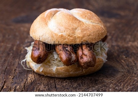 Similar – Image, Stock Photo Grilled nuremberger bratwurst. German sausages top view