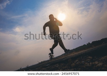 Similar – Image, Stock Photo Active runner jogging on walkway in city park