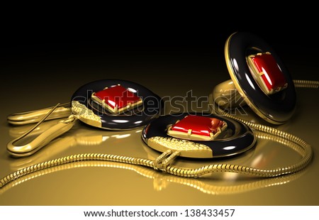 earrings ring and medallion set made out of tantalum and gold