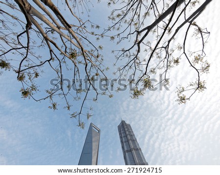 SHANGHAI, CHINA - April 14, 2015: World Financial Center and Jin Mao Tower in Shanghai, China. These are the tallest buildings in Shanghai.