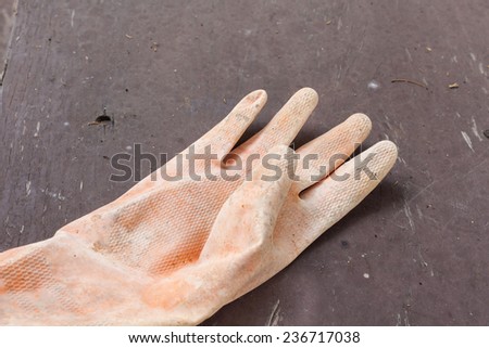 old glove on wood background
