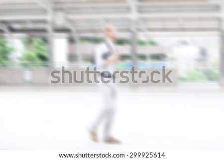 motion blur office worker walking to work