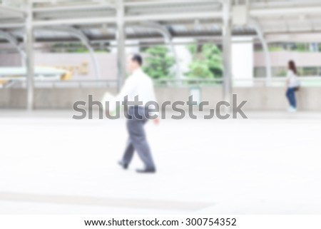 blur office worker walking to work
