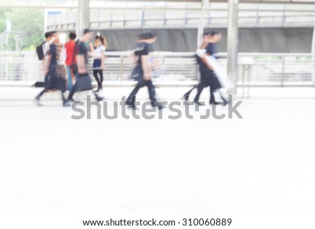 motion blur crowd walking to work
