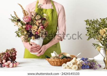 Similar – Image, Stock Photo Arranged bouquet of dried flowers and grasses in natural colours in autumn sunshine in front of a nursery in Oerlinghausen near Bielefeld in the Teutoburg Forest in East Westphalia-Lippe