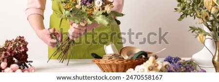 Similar – Image, Stock Photo Arranged bouquet of dried flowers and grasses in natural colours in autumn sunshine in front of a nursery in Oerlinghausen near Bielefeld in the Teutoburg Forest in East Westphalia-Lippe