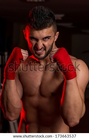 Ready To Fight - Muscular Boxer MMA Fighter Practice His Skills