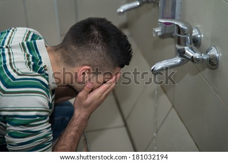 Islamic Religious Rite Ceremony Of Ablution Face Washing