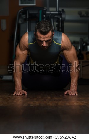 Young Athlete Doing Pushups As Part Of Bodybuilding Training