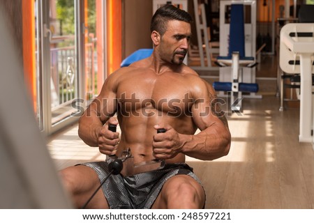 Mexican Bodybuilder Doing Heavy Weight Exercise For Back
