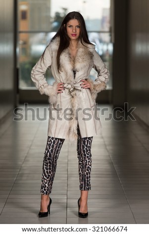 Portrait Of Young And Beautiful Fashion Model In The Shopping Mall