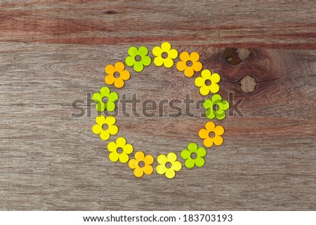 Circle shaped love painted flowers Valentines day old vintage wooden table and copy space