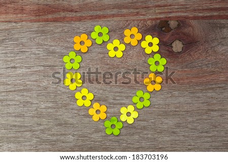Heart shaped love painted flowers Valentines day old vintage wooden table and copy space