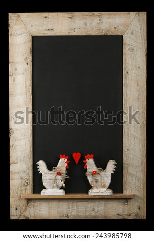 Vintage valentines love roosters with red hearts chalkboard blackboard in reclaimed old wooden frame isolated on black with copy space