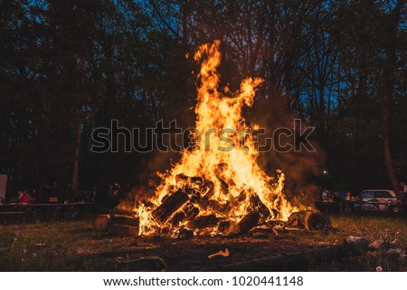 Similar – Foto Bild Großes Feuer aus Brennholz in dunkler Nacht