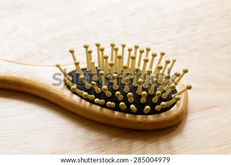 wooden comb with hair