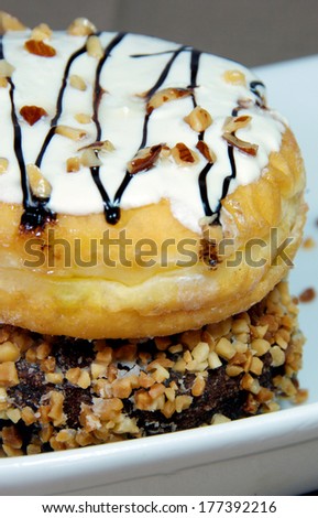 Donut topping with white sugar, almond and chocolate almond donut.