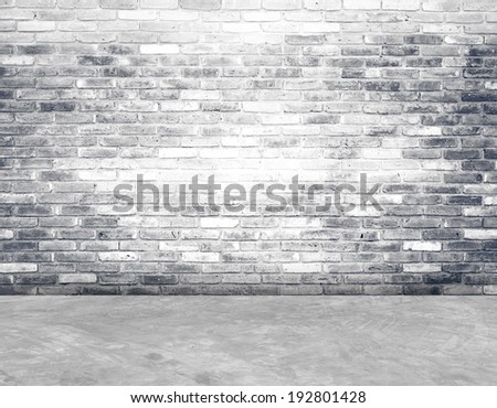 Empty brick wall and cement floor room in perspective.