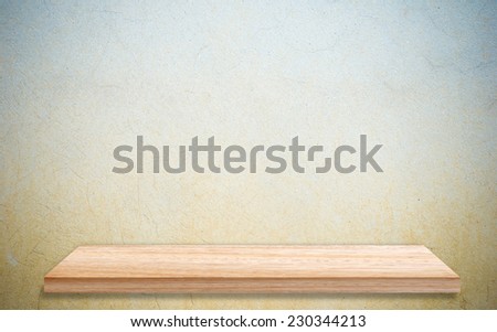 Empty wooden shelf over grunge cement wall, vintage, background, template, display