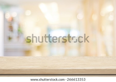 Empty table and blurred store bokeh background, product display montage