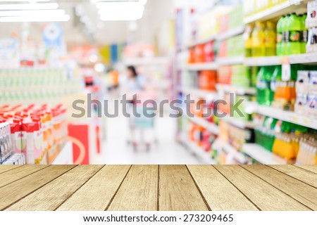 Perspective wood over blur supermarket with bokeh background, Product display, template, business concept
