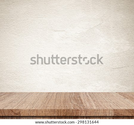 Empty wooden table over grunge cement wall, vintage, background, template, display