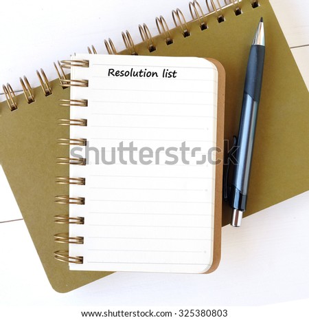 Resolution list on blank paper note book background, for text