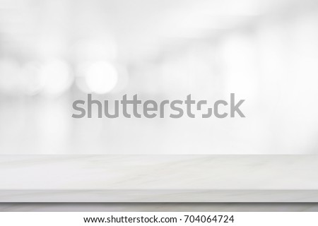 Empty white table top, counter, desk background over blur perspective bokeh light background, White marble stone table, shelf and blurred kitchen restaurant for food, product display mockup, template Stok fotoğraf © 