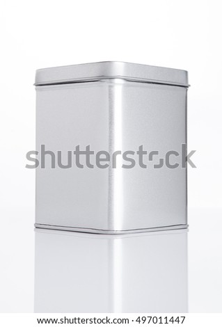 Similar – Image, Stock Photo Closed metal can placed on two colored plates on table