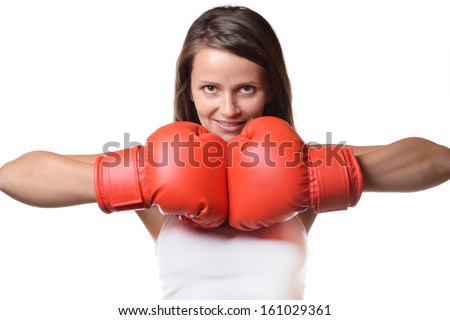 beautiful smiling woman with the red boxing gloves, isolated on white background