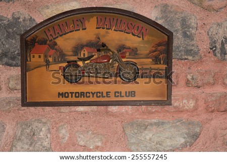Istanbul, Turkey - February 22, 2015: Antique Wood Harley Davidson Motorcycle Club Sign