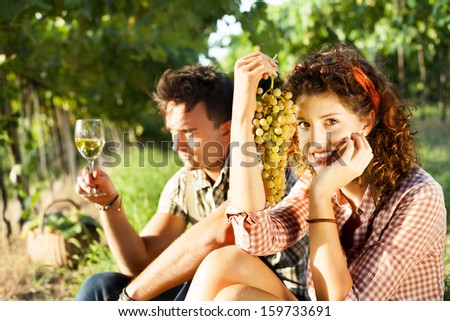 farming couple relaxing after the grape harvest