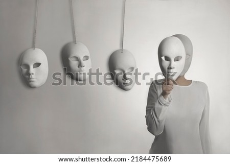 Similar – Image, Stock Photo woman with a mask using her smartphone at the train station