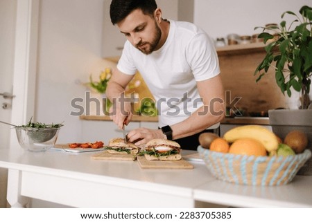 Similar – Image, Stock Photo young man is preparing for a romantic date