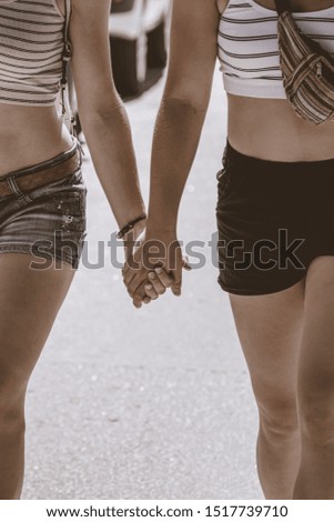 Similar – Image, Stock Photo Anonymous tender homosexual couple hugging on street