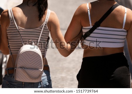 Similar – Image, Stock Photo Anonymous tender homosexual couple hugging on street