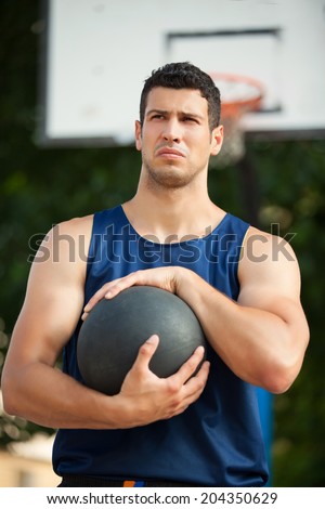 Basketball player on the outdoor basketball court