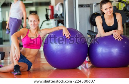 beautiful young women working out in the fitness studio