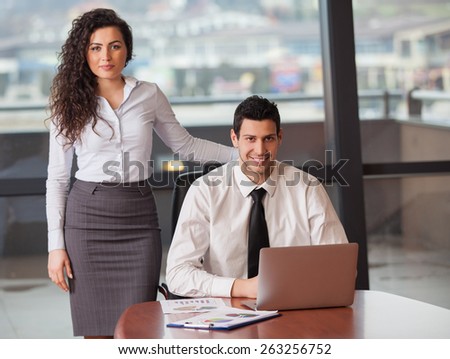 Business people Having Meeting Around Table In Modern Office