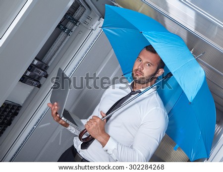business man engeneer in modern datacenter server room