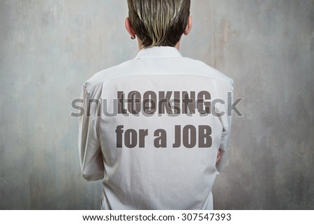 Title on the man\'s back - Looking for a job
